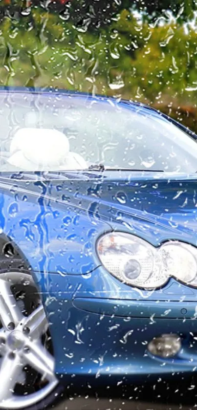 Blue sports car with raindrops on window.