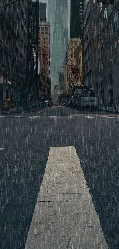 Rainy city street with skyscrapers and a colorful umbrella.