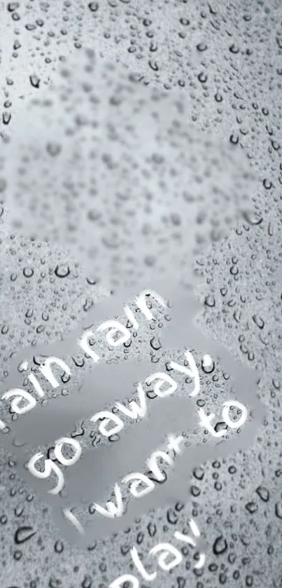 Raindrops on glass with calming text on mobile wallpaper.