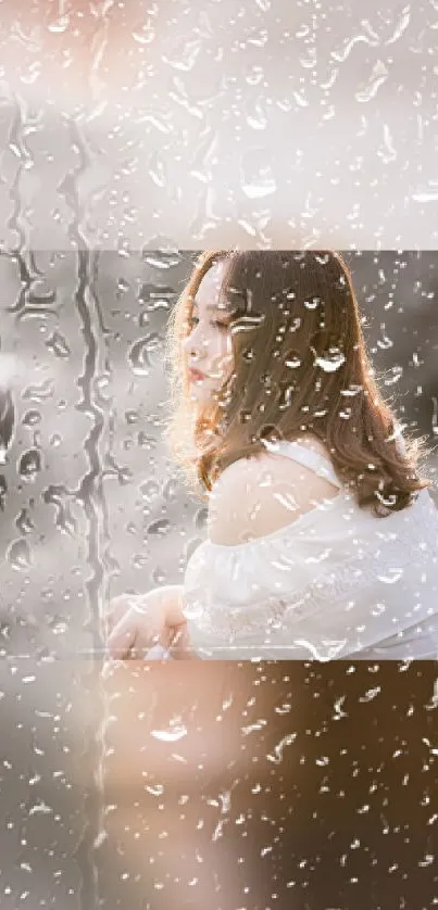 A woman behind a rainy window, creating a serene and reflective mood.