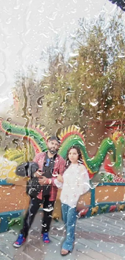 Rainy day view of colorful dragon statue in a scenic park.