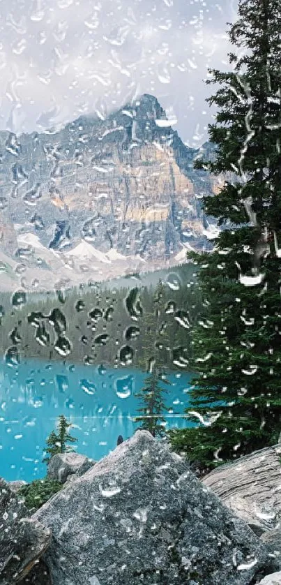 Rain-soaked window view of mountains and blue lake.