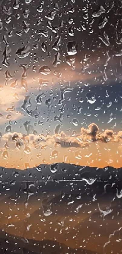 Rainy mountain sunset with raindrop-covered window view.