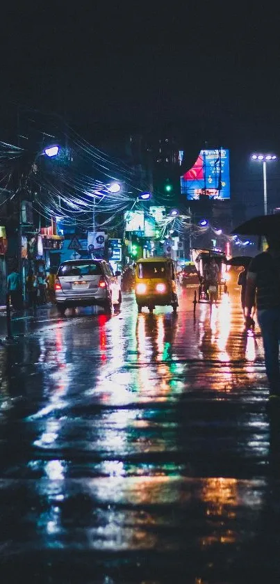 Rainy city street at night with glowing reflections.