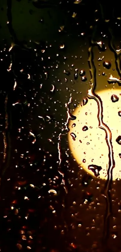 Raindrops on glass at night with soft light glow.