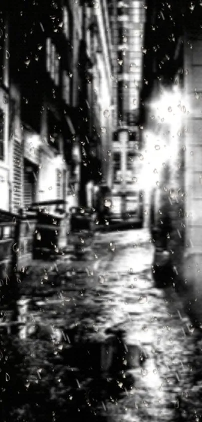 A moody black and white urban alley illuminated by rain and street lights.