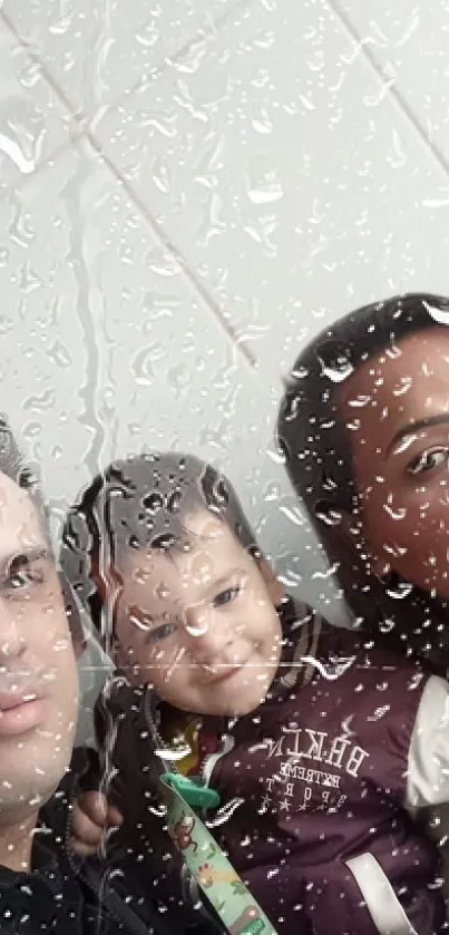 Family behind rainy window with raindrops on glass.