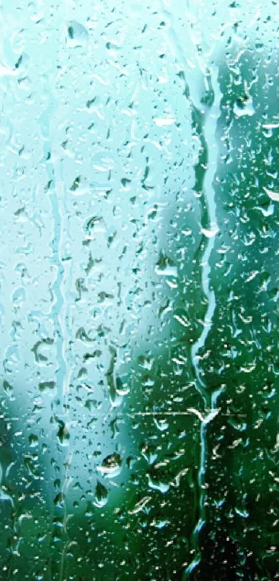 Mobile wallpaper with raindrops on a window, showing a green blurred background.