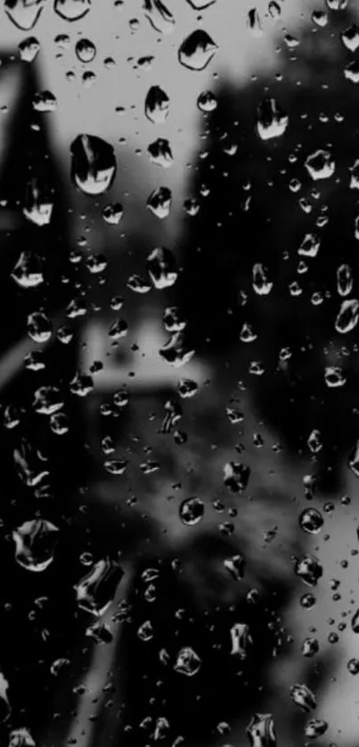 Raindrops on a window creating a serene mobile wallpaper.