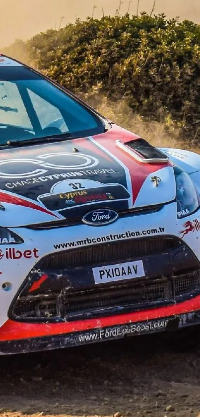 Rally car speeding on dirt track in dynamic motion.