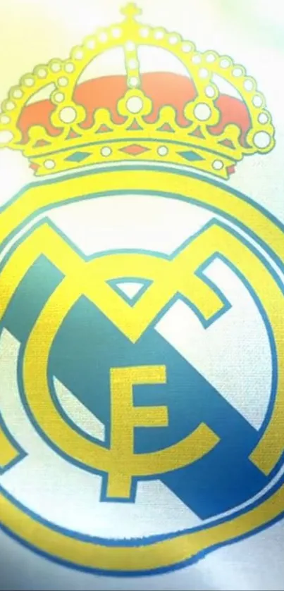 Real Madrid emblem with crown on flag background.