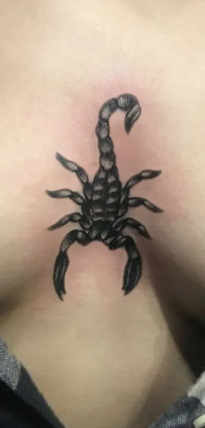 Realistic scorpion tattoo on skin with detailed black ink design.