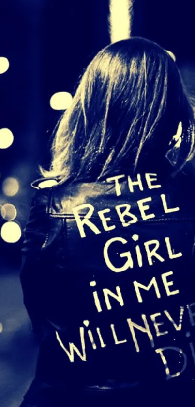 Rebel girl in a leather jacket on a dark city street wallpaper.