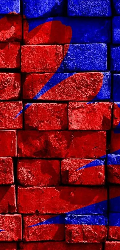 Vibrant red and blue graffiti on a brick wall.