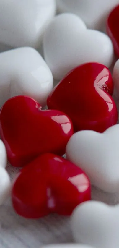 Red and white heart shapes creating a charming phone wallpaper.