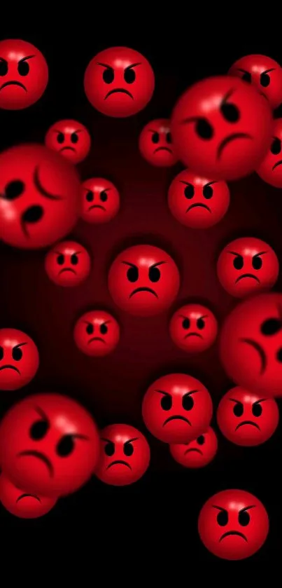 Red angry faces scattered on a black background, creating an expressive wallpaper.