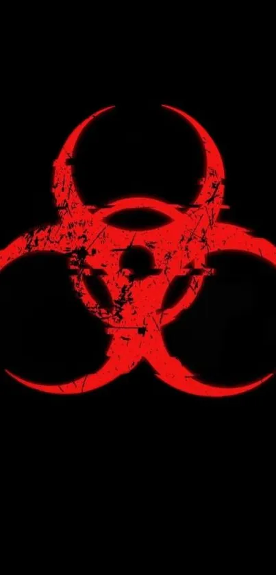 Red biohazard symbol on a black background wallpaper.