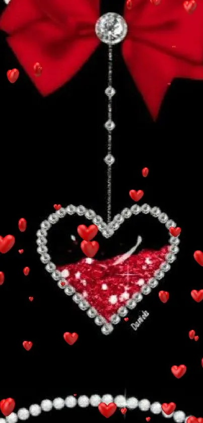 Luxurious red bow and diamond heart wallpaper with black background.