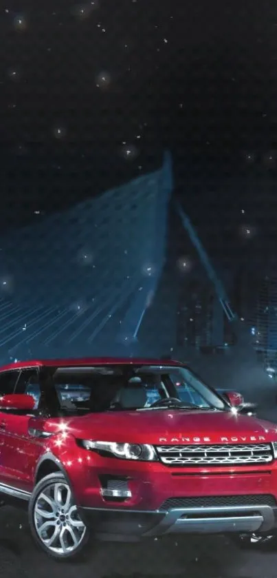 Sleek red car at night under starry urban sky.