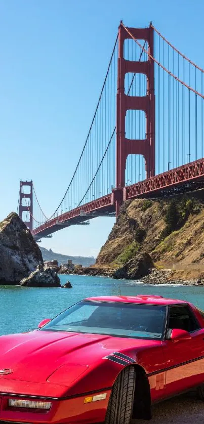 Red sports car by Golden Gate Bridge with scenic view.