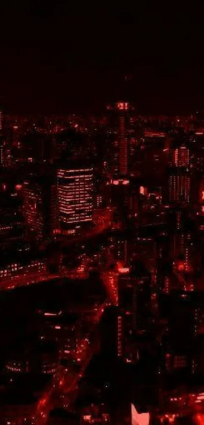 Stunning red-lit cityscape at night with skyscrapers and glowing urban atmosphere.