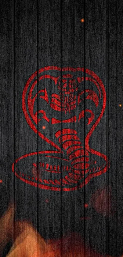 Red cobra on black wood textured background wallpaper.