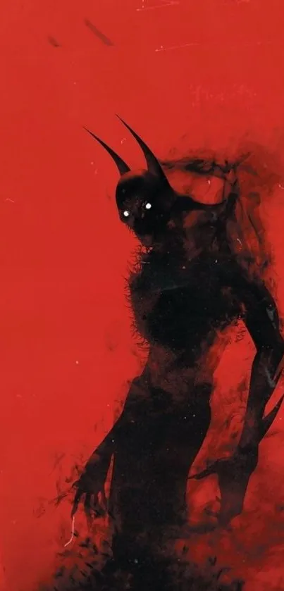 Eerie red demon silhouette artwork on red background.