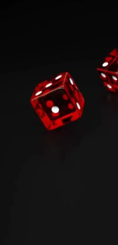 Red dice with white dots on black background mobile wallpaper.