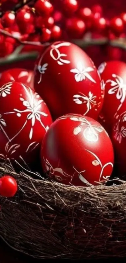 Red Easter eggs with floral patterns in a nest.