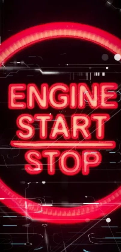 Neon red engine start stop button on dark background.