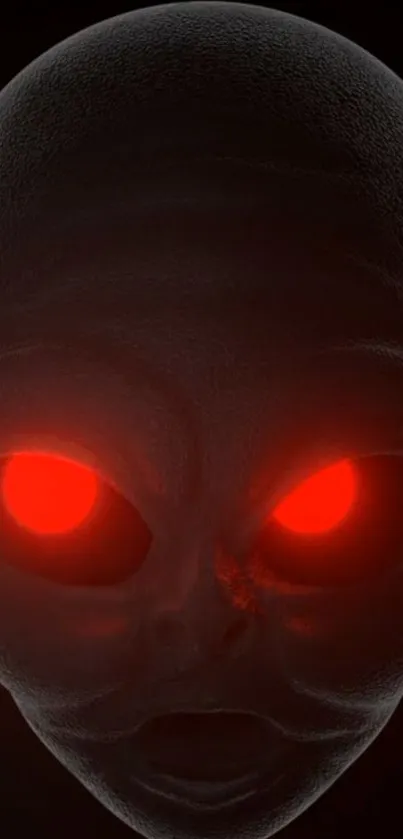 Mysterious alien face with glowing red eyes on a dark background.