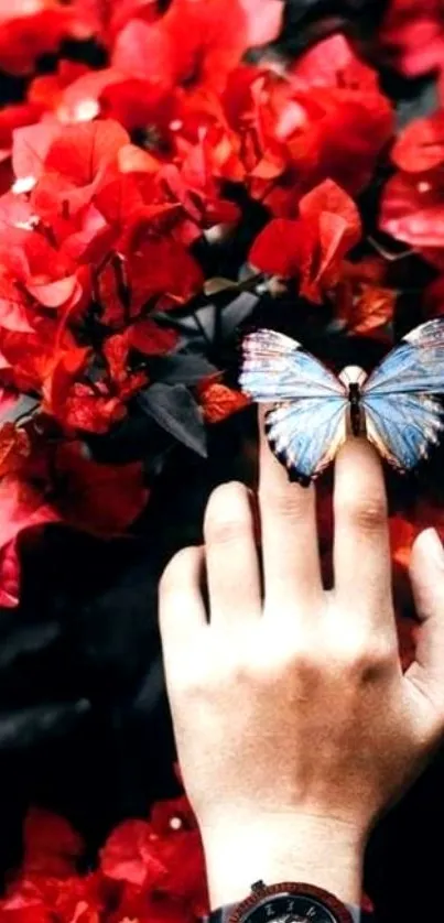 Hand with butterfly amid red flowers, featuring a wristwatch.