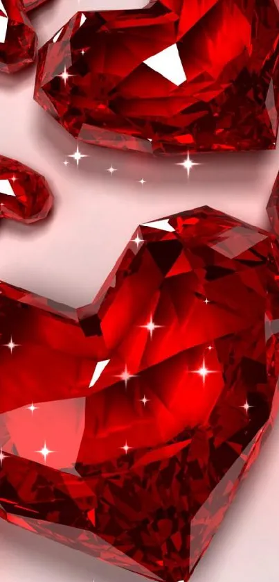 Red gem hearts with crystal texture on a light background.