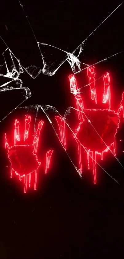 Neon red handprints on shattered black glass wallpaper.