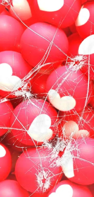 Red balls with white heart pattern, vibrant mobile wallpaper.