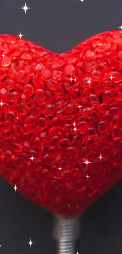 Glittering red heart wallpaper for mobile phone.