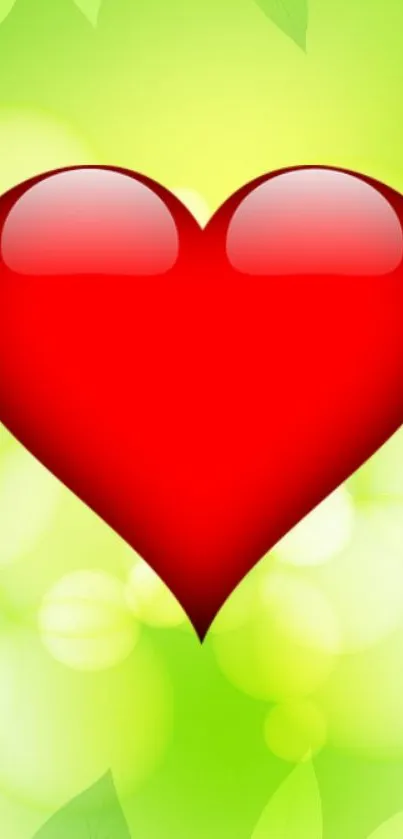 Red heart on a green leafy background wallpaper.