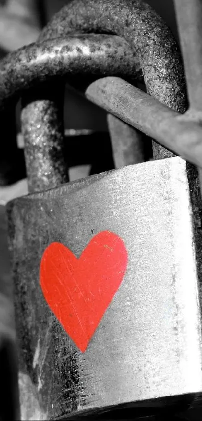 Red heart on a metallic padlock, symbolizing love and security.