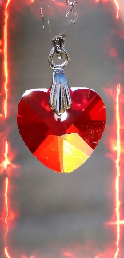 Red heart pendant with blurred background.