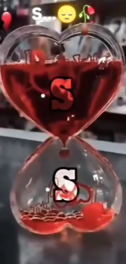 Heart-shaped hourglass with red liquid.