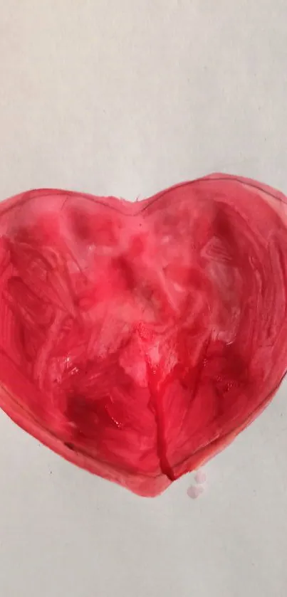 Watercolor red heart on a soft background.