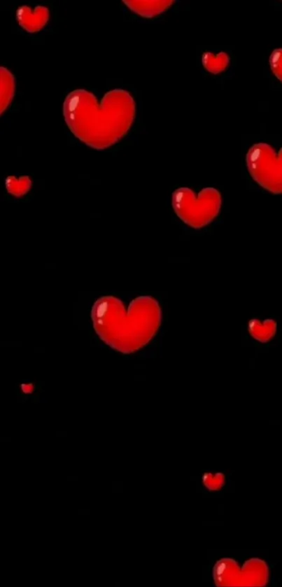 Red hearts on a black background, perfect for romantic themes.