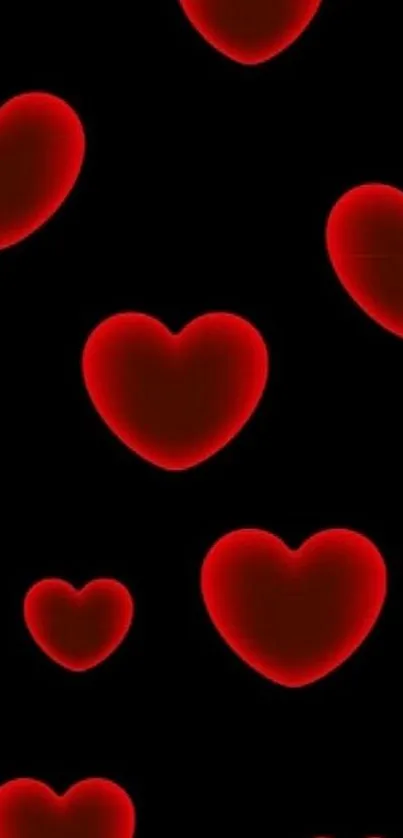 Vibrant red hearts on black background for mobile wallpaper.