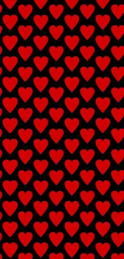 Mobile wallpaper with red heart pattern on black background.