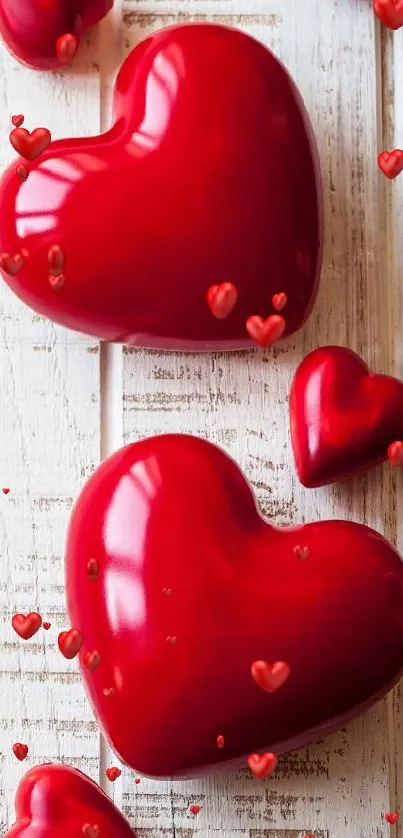 Glossy red hearts on rustic wooden background, perfect for mobile wallpaper.