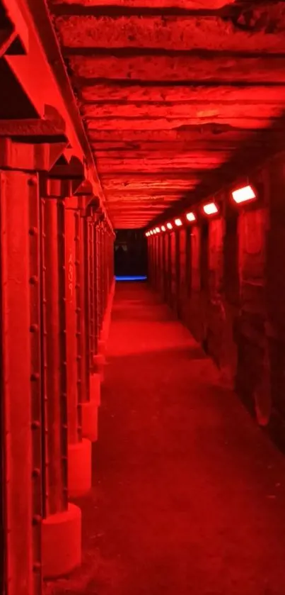 Red-lit tunnel with moody lighting and mysterious atmosphere.