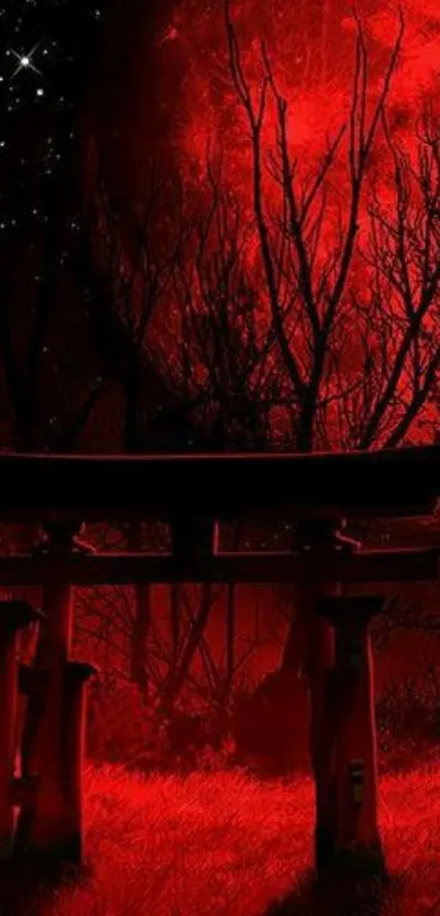 Red moon illuminating a Torii gate in a mystical night setting.