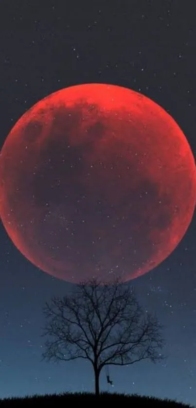 Red moon and tree silhouette night sky wallpaper.