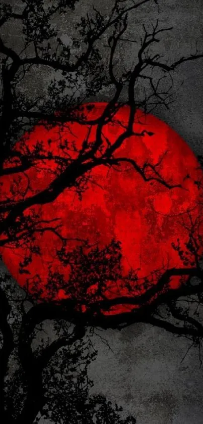 Silhouette tree with red moon background, artistic mobile wallpaper design.