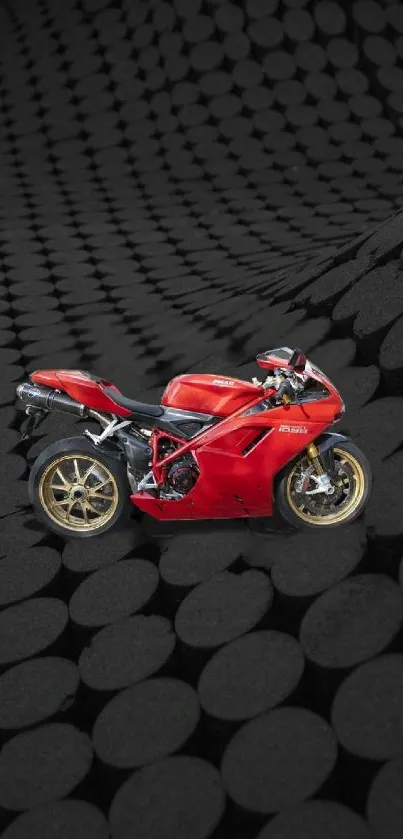 Red motorcycle on a dark geometric abstract background.